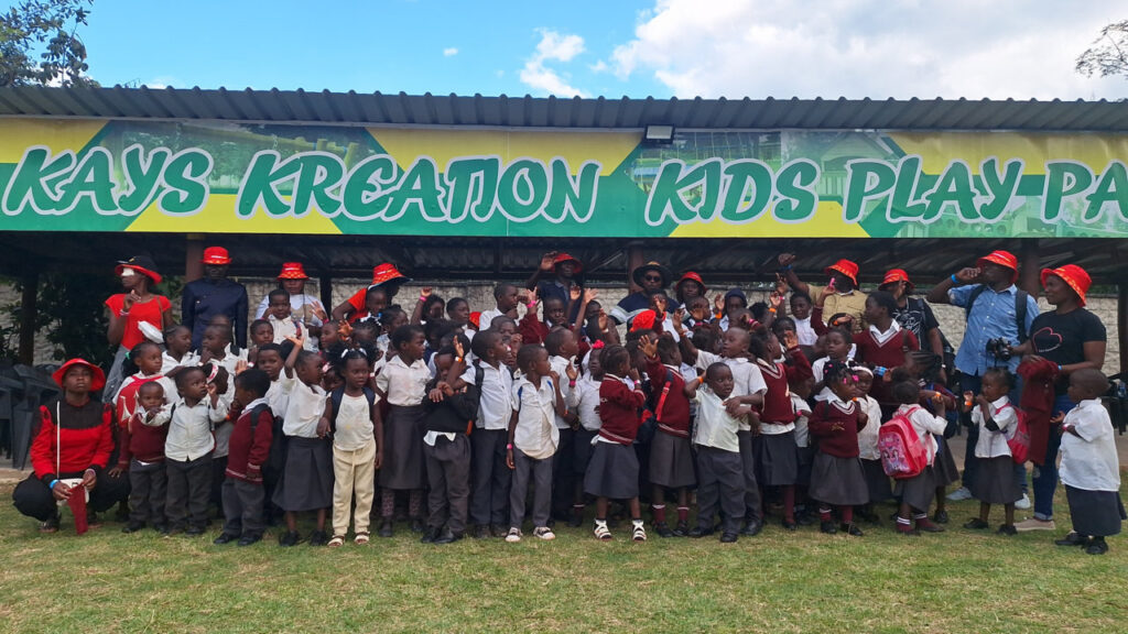 Children and teachers from All Is Grace School pose together during one of their school trips to Kreation Kids Play Park