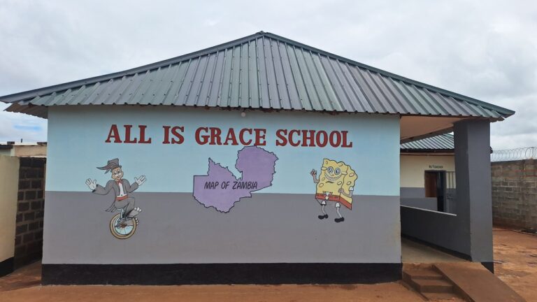 Photo of All Is Grace School in Zambia, where AGCPI is supporting vulnerable children through education and emotional healing.